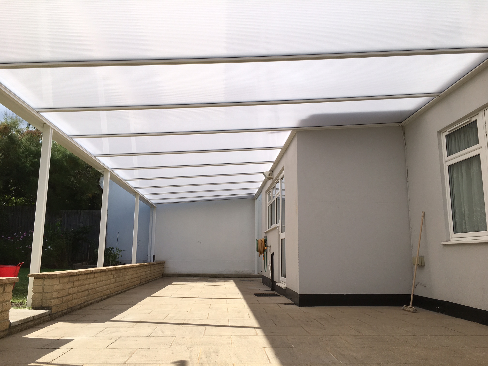 polycarbonate roof letting sunshine through but preventing full glare